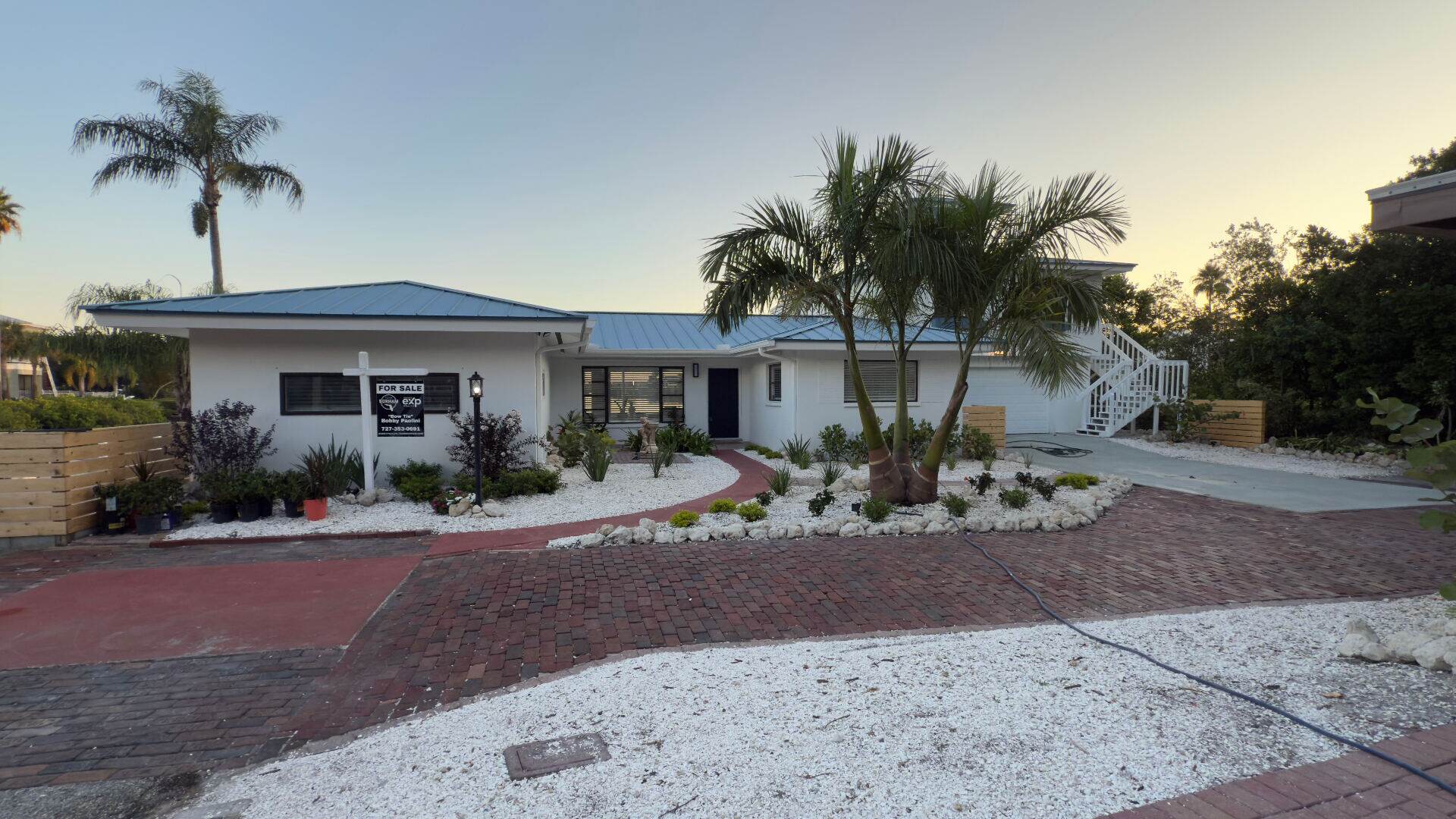 Completed Davis Build & Restore coastal Pinellas restoration, listed by Bobby Paolini at eXp Realty